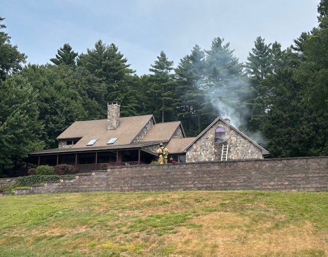 Ludlow firefighters extinguished a two-alarm fire at 101 Timberidge Road in an attached garage before it spread to the home Saturday, July 26.